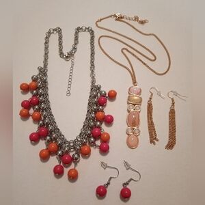 #589.  4 Piece Pink And Gold Necklace And Earring Bundle.